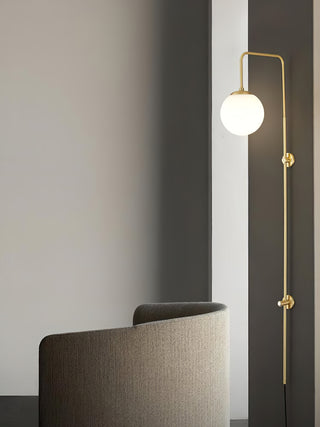 Brass Globe Arm Wall Sconce