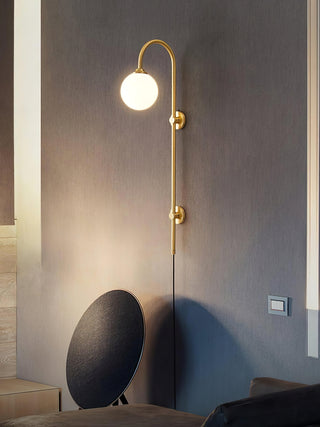 Brass Globe Arm Wall Sconce